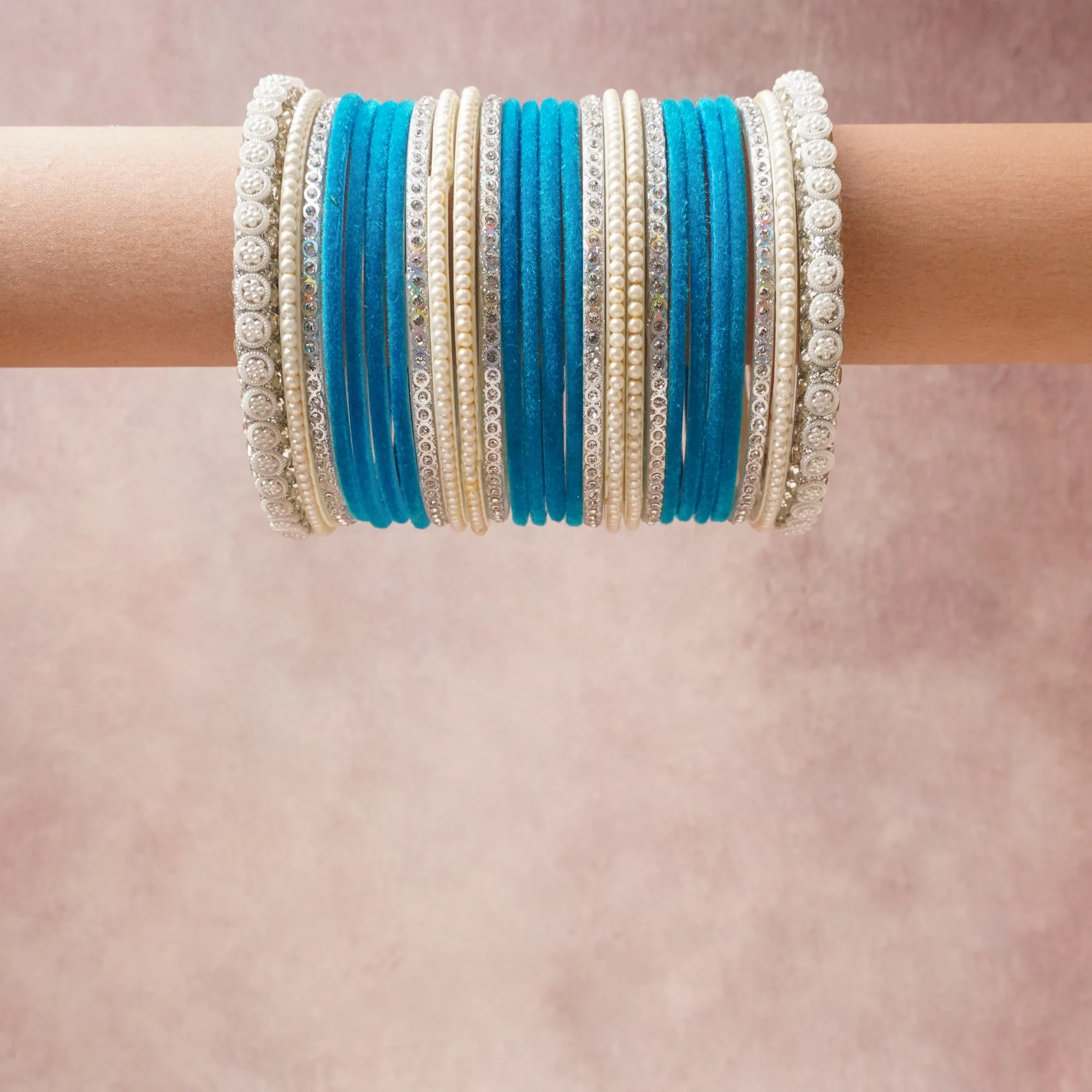 A grounding Cerulean Blue forms the heart of the set, while touches of Silver, Clear, Cream add charm.

A thoughtful composition of Velvet, Silver-tone Metal, Crystals, Faux Pearls, designed to feel complete without being heavy.
Each element layers seamlessly, creating a look that is refined, wearable and quietly striking.